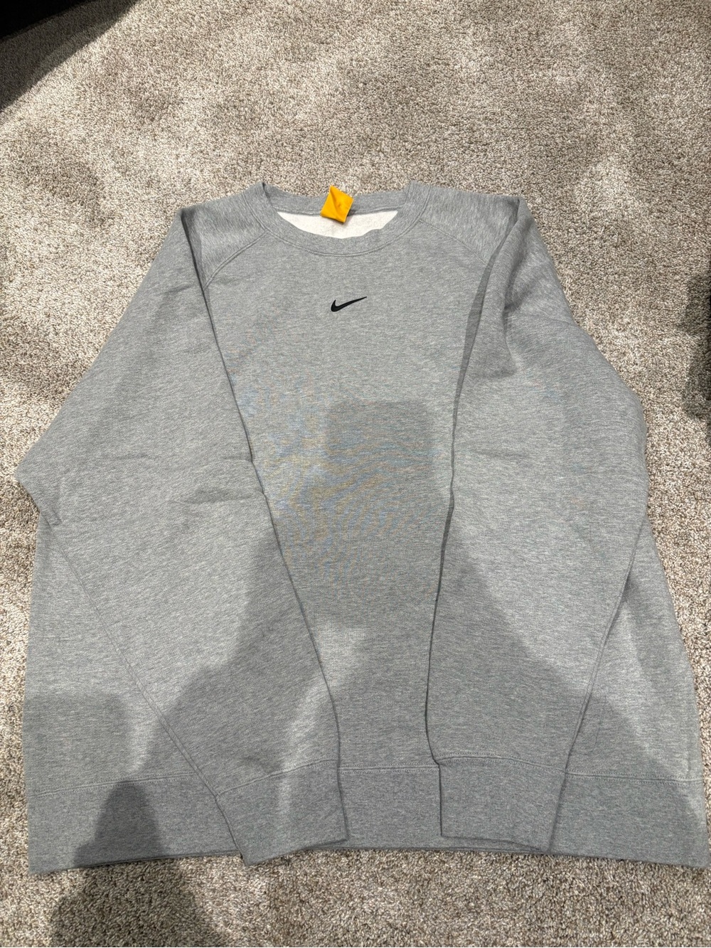 Nike NOCTA Light Gray Crewneck with Yellow Tag